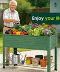 Two Pack Raised Garden Beds Made From Galvanized Steel Planter Boxes With 400 Lb Capacity, man watering plants
