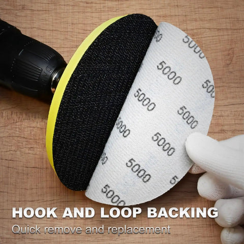 Close-up of 40 Piece 5 Inch Wet Dry Sanding Discs Set With Hook And Loop System, showing 5000 grit sandpaper backing.