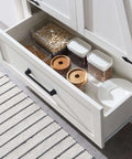 Open drawer in Farmhouse Pantry Cabinet 72 Inch Tall Wood Storage With Adjustable Shelves Barn Style Doors And Drawer All In One Kitchen And Dining Room Organizer In Antique White, storing various kitchen items.