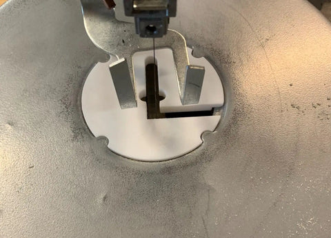 3D Printed Scroll Saw Throat Plate Insert For 16 Inch Variable Saw Replacement Part For Woodworking Enthusiasts With 80 Millimeter Disk And 7 Millimeter Thick For A Snug Easy Fit installed in saw.