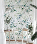 Peel And Stick Boho Wallpaper Green White Botanical Leaf Floral Wall Mural Vibe in modern living room with plants