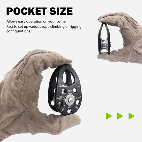 Slack Tending Pulley Kit For Doubled Rope Climbing DDRT System micro pulley in gloved hand, pocket size view