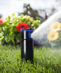 PGP Ultra Rotor Sprinkler Head With 4 Inch Pop Up And 3 Quarter Inch Inlet Pressure Regulated Body in operation on grassy lawn