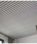 No Hustle Peel And Stick Wallpaper Featuring Realistic Wood Grain Texture self adhesive ceiling covering in striped design.