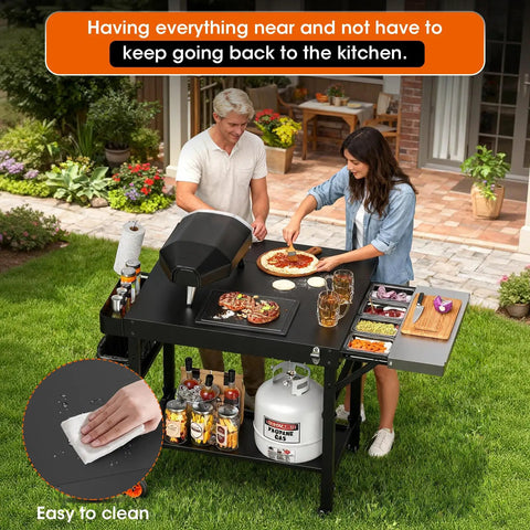 Heavy Duty Pizza Oven Table With Topping Station On Wheels Gigantic Countertop Cart For Large Pizzas And Outdoor Grillin Fits Big Ovens And Most Cart Sizes Easy Assembly Stable Stand For Parties shown in a backyard setting with two people making pizza.