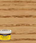 Golden Oak Wood Putty Filler For Quick Scratch And Nail Hole Repair Non Hardening Stain Matched DIY Wood Touch Up 3.75 Oz Tub on wood background.