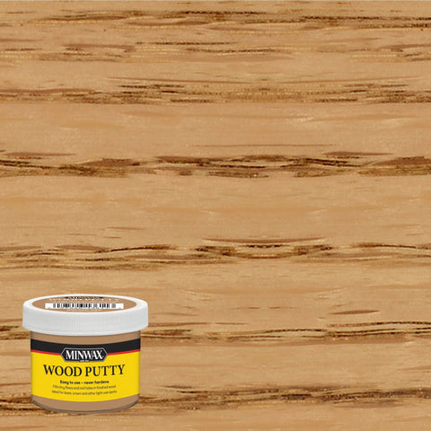 Golden Oak Wood Putty Filler For Quick Scratch And Nail Hole Repair Non Hardening Stain Matched DIY Wood Touch Up 3.75 Oz Tub on wood background.
