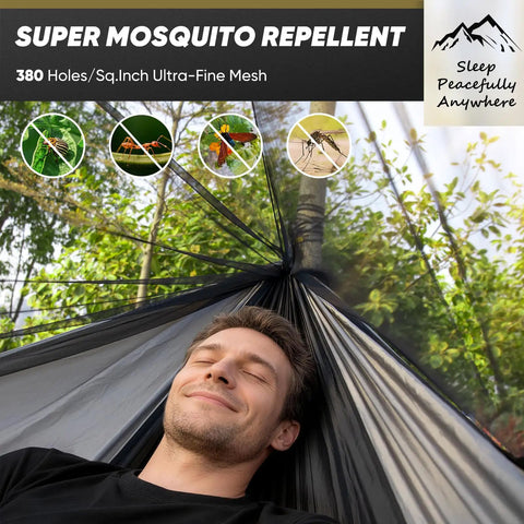 Man relaxing in a Bug Free Camping Hammock With Mosquito Net 500 Lb Capacity Includes Tree Straps 2 In 1 Double Or Single Setup