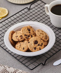 175 Pack 16 Oz Sugarcane Bagasse Soup Bowls Microwave Safe Heavy Duty Disposable For Hot Soups Desserts And Snacks Eco Friendly Compostable Dinnerware with chocolate chip cookies.