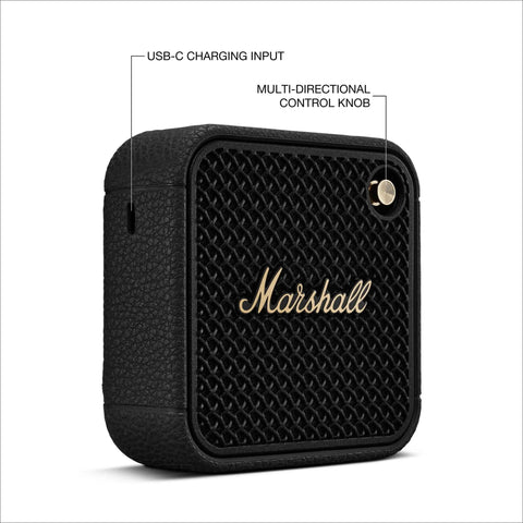 Black Willen II Portable Bluetooth Speaker with USB-C charging and control knob, rugged waterproof and dust proof design, brass accents.