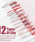 Rose Series Gel Pens Set Of 12 With Black And Pink Ink 0.5mm Fine Point showing 12 types of pen clips on a grid background.