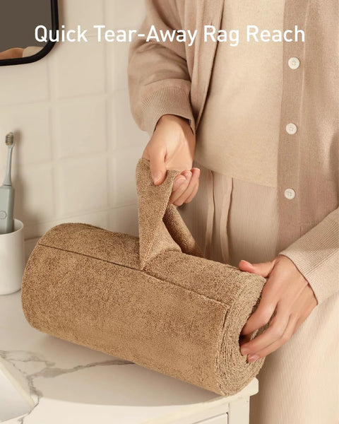 Side view of tan microfiber cleaning cloth roll being unrolled; reusable, washable 12x12 towels