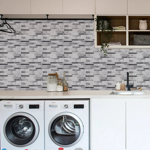 Laundry room with 10 Sheet Peel And Stick Tile Backsplash In Grey 12x12 Premium Kitchen Tiles above washing machines.
