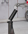 Cobra Water Pump Pliers, 10 Inch, showing adjustable jaw gripping a black pipe for heavy duty plumbing, quick fine adjustment