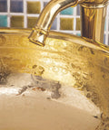 Gorgeous Gold Ceramic Round Vessel Sink Adds Fresh Flair For Your Bathroom Vanity Top Shelf Countertop Wash Basin with faucet and intricate design.