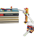 Chain Reactions Design And Build Amazing Moving Machines Kit For Curious Makers And Kid Engineers With Hands On STEM Fun Create Mind Blowing Rube Goldberg Style Setups And Awesome Moving Builds, LEGO pieces on book stack