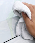 Hand using Bulk Terry Cloth Cleaning Rags 300 Pack, 14x17 Inch 100% Cotton Towels for Kitchen, Auto Shop, and Bar Use to wipe spill