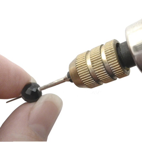 Using Diamond Reamer Set With Four Interchangeable Tips to enlarge a bead hole in jewelry making