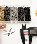 Sweet Gear Mini Screw Eye Hooks Rolling As A Hella Thick 750 Piece Multicolor Stash Built Tough For Easy DIY Jewelry Making Resin Crafts And Hanging Lightweight Parts in a clear box with various colors.
