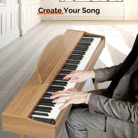 Person playing 88 Key Fully Weighted Digital Piano With Hammer Action Keyboard, Burlywood finish, in a bright room.