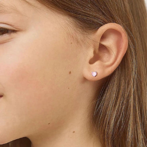 Hypoallergenic Surgical Steel Earrings for Girls and Toddlers with Screw Back Flat Posts Nickel Free and Safe for Sensitive Ears Kid Friendly Mixed 14K Gold and Silver Stud Set Featuring Heart Flower Pearl Star Shapes. pink heart stud on child’s ear