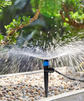 30 Pack Drip Irrigation Emitters With Stakes, 360 Degree Adjustable Fan Sprayers For One Quarter Inch Tubing in garden setup