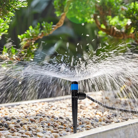 30 Pack Drip Irrigation Emitters With Stakes, 360 Degree Adjustable Fan Sprayers For One Quarter Inch Tubing in garden setup