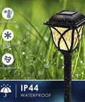 Close-up of 6 Pack Solar Pathway Lights Outdoor LED Garden Lights Waterproof Landscape Lights in grass with waterproof icons