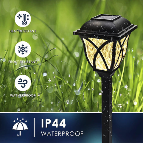 Close-up of 6 Pack Solar Pathway Lights Outdoor LED Garden Lights Waterproof Landscape Lights in grass with waterproof icons