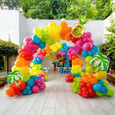 Hawaiian Summer Balloon Arch Kit With 129 Pieces In Hot Pink Teal Blue Lime Green Yellow Orange And Confetti For Totally Dope Tropical Party Vibes And Easy Indoor Outdoor Celebrations displayed outdoors.