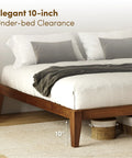 Premium King Solid Wood Bed Frame With Classic Japanese Joinery And Reinforced Wooden Slats For Rock Solid Support That Ditches The Box Spring Requirement While Providing Hassle Free Assembly For Your Cozy Bedroom Vibe In Rich Walnut showing 10-inch under-bed clearance.