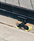 2 Sets Rock Solid 4 Inch V Groove Gate Roller Wheels Hardened Steel Double Ball Bearing 3000 lbs Capacity on sliding gate track.