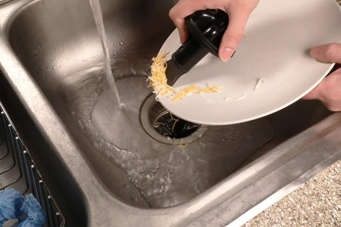 Disposal Genie II Garbage Disposal Strainer And Stopper, Kitchen Sink Drain Splash Guard With Food Scraper, Black Finish, 1 Pack in use