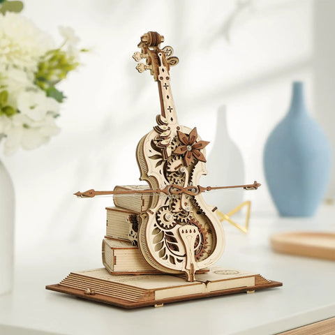 One Fifth Scale 3D Cello Model Kit with Base 199 Piece Wooden Music Box Building Kit displayed on a desk