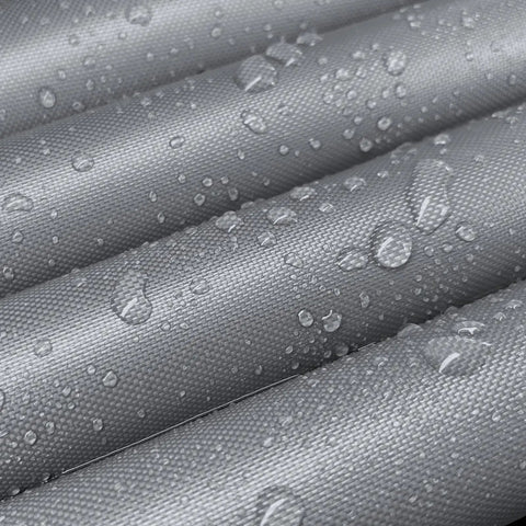 Close-up of grey waterproof 600D fabric with water droplets from Outdoor Waterproof Patio Furniture Covers 4 Piece Set For Chairs Loveseat and Coffee Table Heavy Duty.