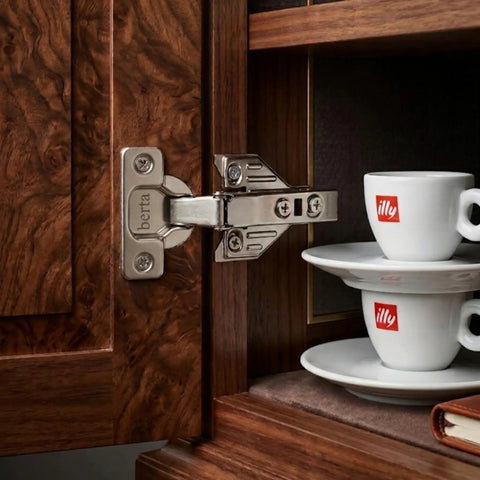 Two Pack Full Overlay Face Frame Soft Close Concealed European Cabinet Hinges installed on a wood cabinet, showcasing smooth operation.