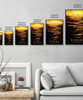 Various sizes of black framed Sunset Ocean Rowing Wall Art Canvas Print Poster Framed In Black Modern Minimalist Aesthetic Decor For Living Room Bedroom Office Vibrant Coastal Colors Vibe Waterproof Fade Resistant displayed above a sofa.