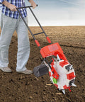 Person using a Walk-Behind Garden Seed Planter With Storage Box Metal Precision Manual Seeder For Planting Corn Soybeans Peanuts