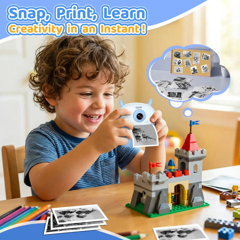 Kids Camera Instant Print 1080P Video 2.4 Inch Screen Selfie Digital Camera For Ages 3 To 12 Instant Black And White Photos Plus Color Save On SD Card Blue Gift For Boys And Girls, child holding blue camera with printed photo