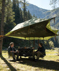 Two Person Triangle Hammock Tent For Easy Lay Flat Comfort With Three Point Setup Including Bug Net And Rainfly in forest setting