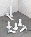 Model 82 289 Leveling Pins 50 Pack For Concrete Pours With Self Adhesive Backing shown on concrete surface
