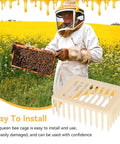 Beekeeper holding frame next to Beekeeping Queen Marker Cage Kit 20 Pack Clip Bee Catcher For Apiary Management And Hive Maintenance