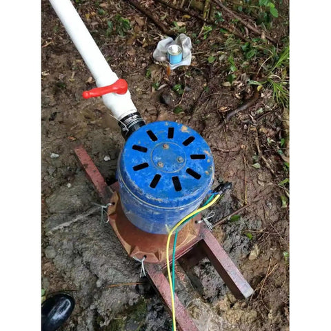 5000W Water Turbine Generator 220V Hydroelectric Power System installed outdoors with cast iron shell and copper coil