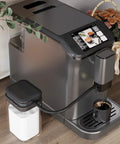 Super Automatic Espresso Maker With Built In Grinder And One Touch Milk Frother For Low Stress Brewing And Knockout Lattes In Sleek Premium Gray Finish pouring coffee into a black cup.