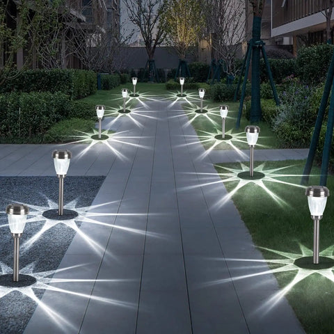 Outdoor path lit with Stainless Steel Glass Solar Outdoor Lights 8 Pack Super Bright Lit Pathway Garden Landscape Lights Waterproof Solar Powered.