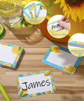 Lemon Themed Classroom Name Tags Set Of 48 Self Adhesive Desk Nameplates with large writing area on a wooden table