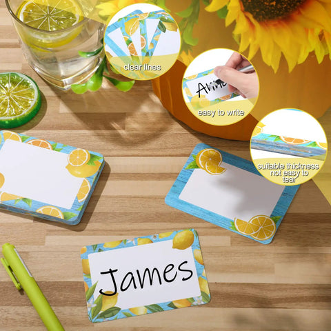 Lemon Themed Classroom Name Tags Set Of 48 Self Adhesive Desk Nameplates with large writing area on a wooden table