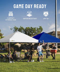 10x10 Pop Up Canopy Tent With Patented CenterLok One Push Setup For Instant Easy Up Includes STO N GO Storage Bag Eight Stakes And Four Ropes White Outdoor Shade For Parties Events And Backyard shown over people in a park setting.