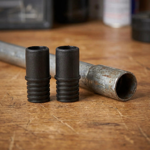 Four Piece 22mm Threaded Tips Replacement For Broom Handles And Household Cleaning Tools Plastic Multi Tool Adapter Screw On Connector For Reliable Repair, two plastic adapters next to a metal pole.