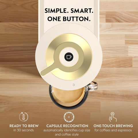 Top view of Vertuo Next Coffee And Espresso Maker By DeLonghi In Creamy White With Gold, one-touch brewing button and a cup of coffee.